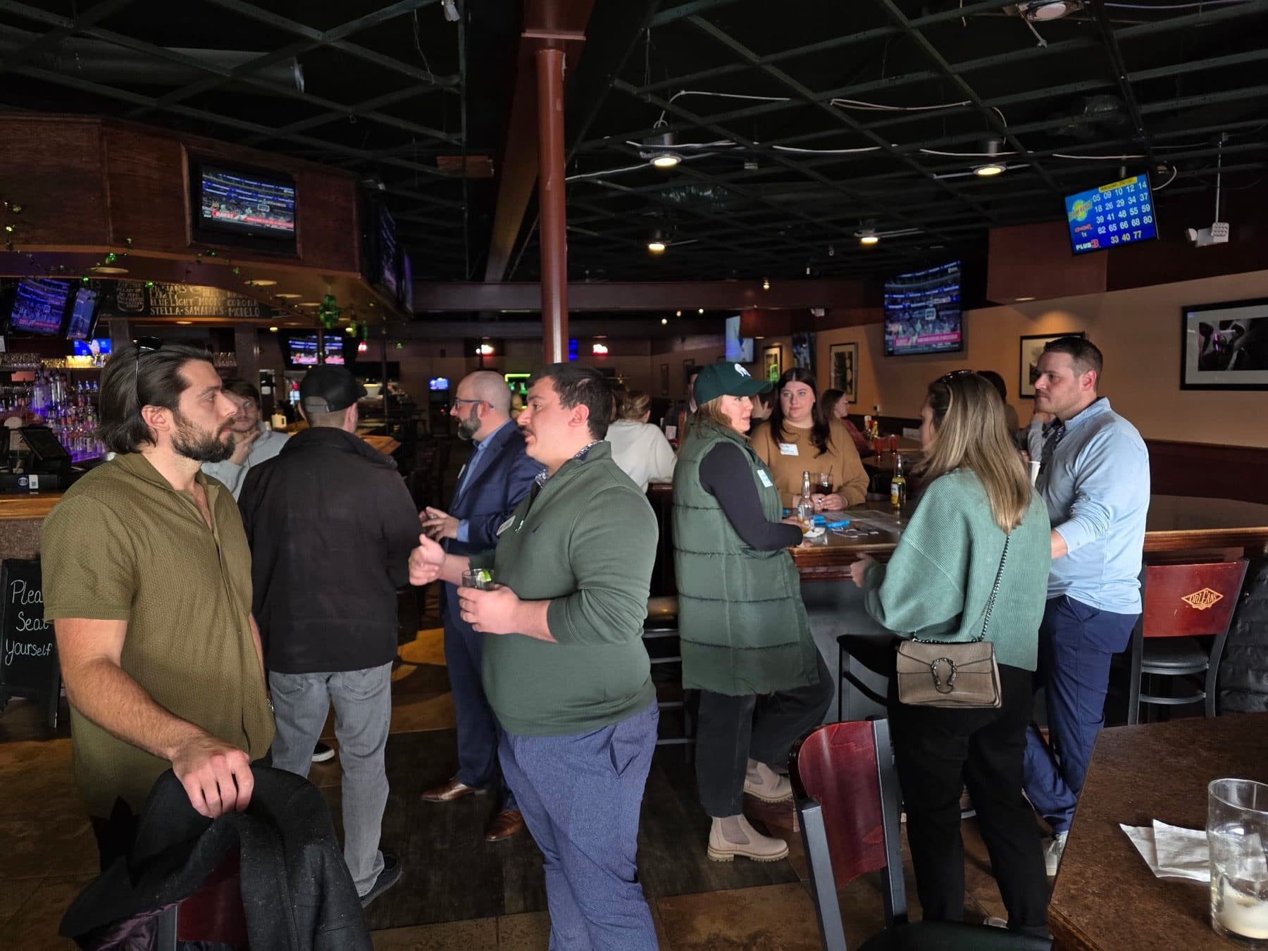 Anthony Buck talking with members at a Macomb County Chamber mixer