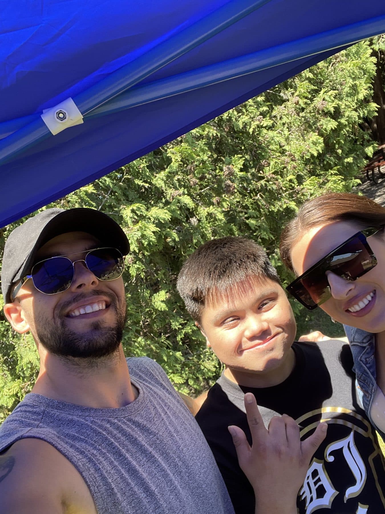 Anthony Buck with friends at an outdoor community event